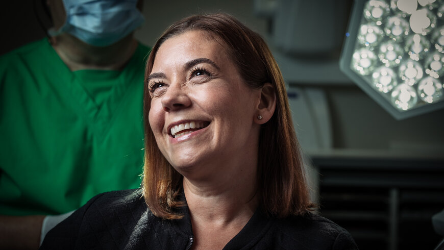 Woman smiling at dentist